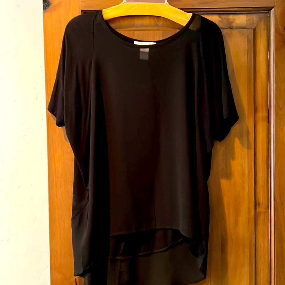 Dressy, black top size large see-through in the front, full coverage in the back